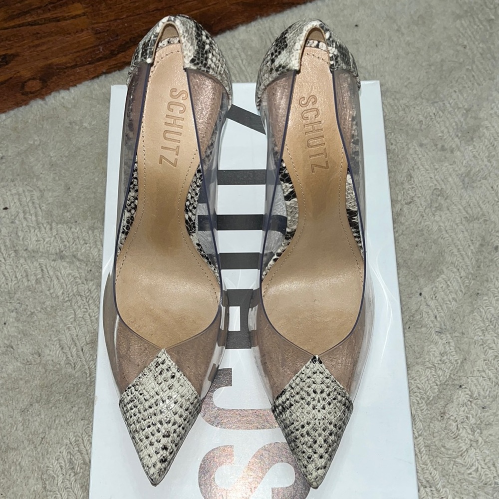 Schutz vinyl and leather pumps